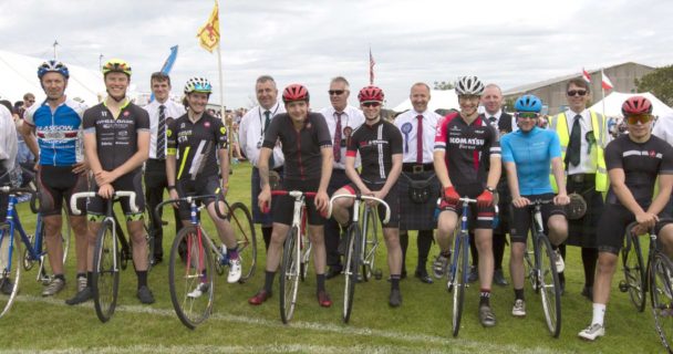 Cyclist and officials pose for a photograph before the start of the De'il Tak the Hindmost race. Photo: Ann-Marie Jones/Northern Studios